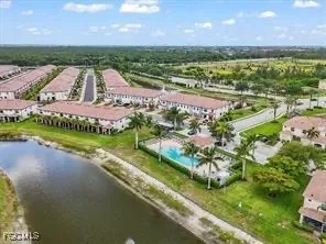 an aerial view of a house with outdoor space swimming pool and outdoor seating