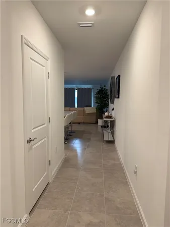 a kitchen with a sink cabinets and stainless steel appliances