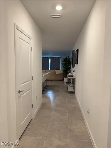 a kitchen with a sink cabinets and stainless steel appliances