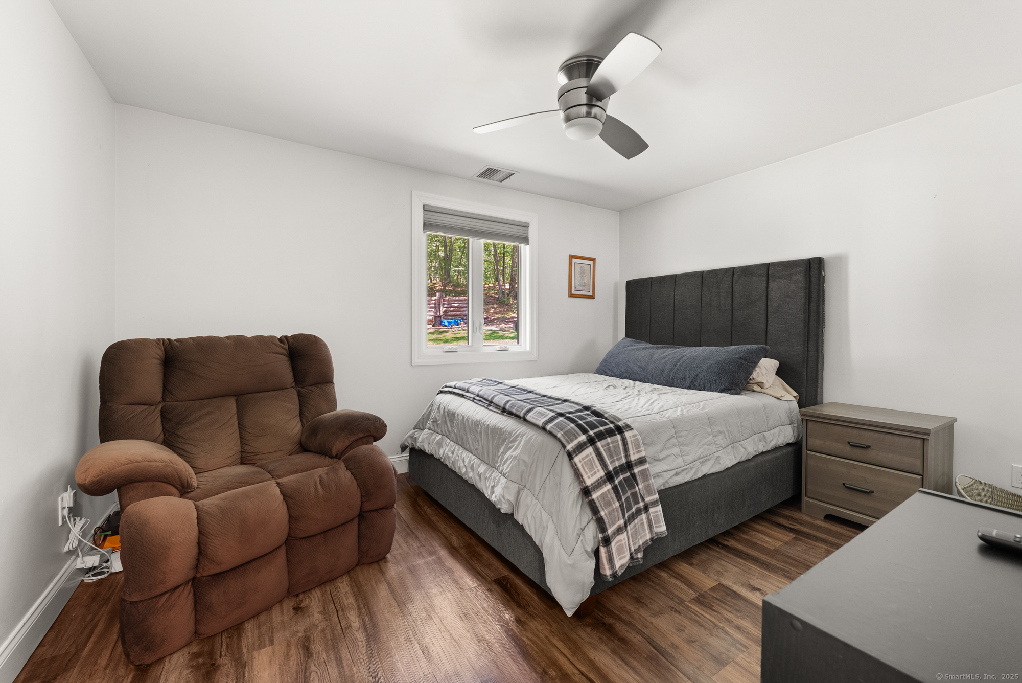 85 Good Hill Road Roxbury, CT 06783 - Photo 16 of 33 a bedroom with bed couch and window