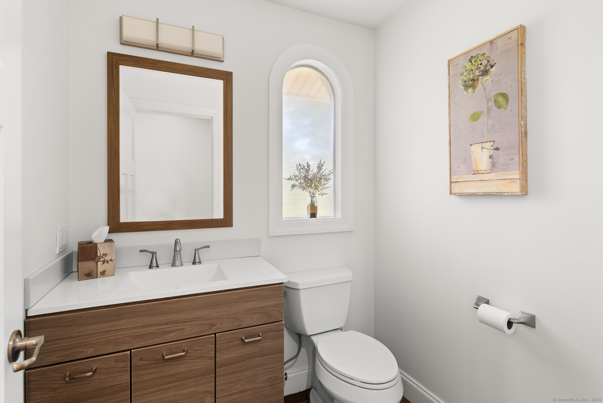 85 Good Hill Road Roxbury, CT 06783 - Photo 17 of 33 a bathroom with a toilet sink and mirror