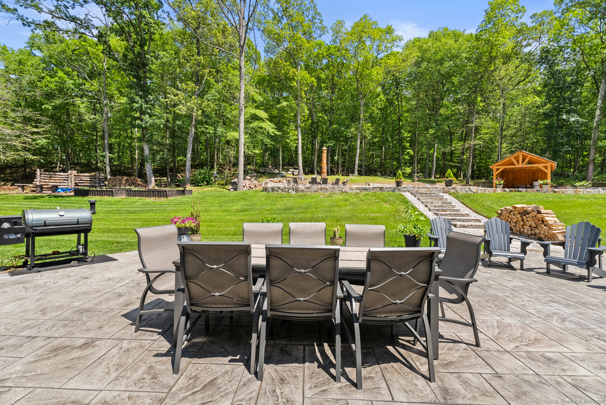 85 Good Hill Road Roxbury, CT 06783 - Photo 19 of 33 a view of a chairs and table in patio