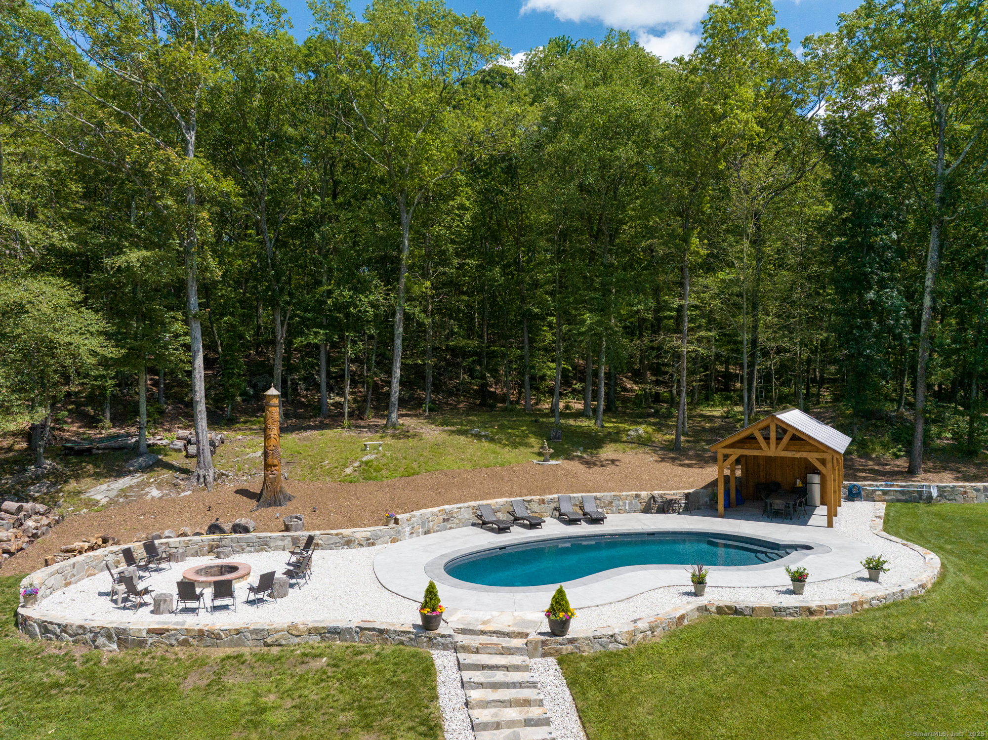 85 Good Hill Road Roxbury, CT 06783 - Photo 20 of 33 a view of a table and chairs in the patio