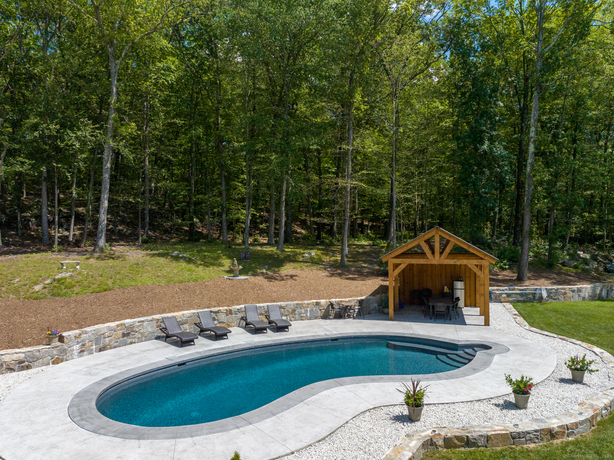 85 Good Hill Road Roxbury, CT 06783 - Photo 32 of 33 a view of a wooden deck with a yard