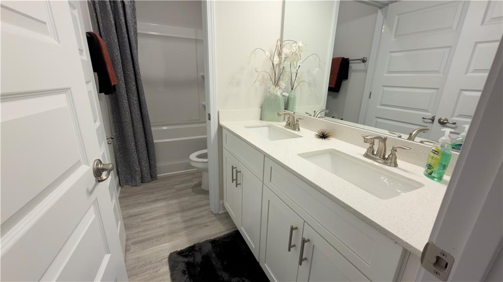 620 Bald Ridge Circle Demorest, GA 30535 - Photo 36 of 43 a bathroom with a sink a mirror and a shower