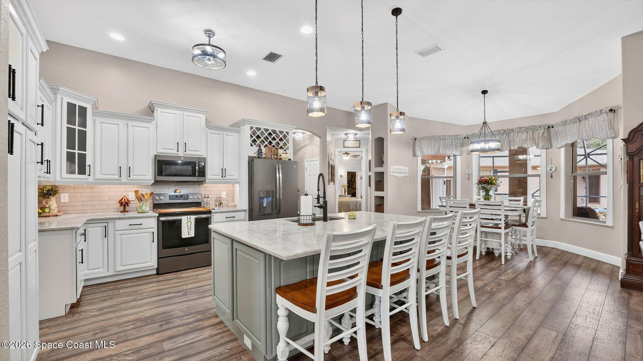 3219 Pheasant Trail Mims, FL 32754 - Photo 14 of 81 Extra island seating