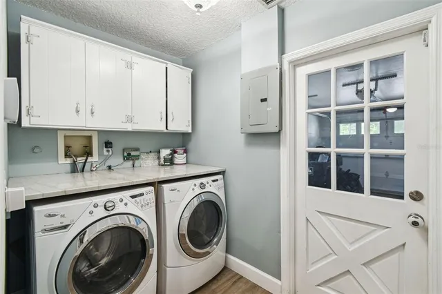 a view of a storage & utility room with washer and dryer