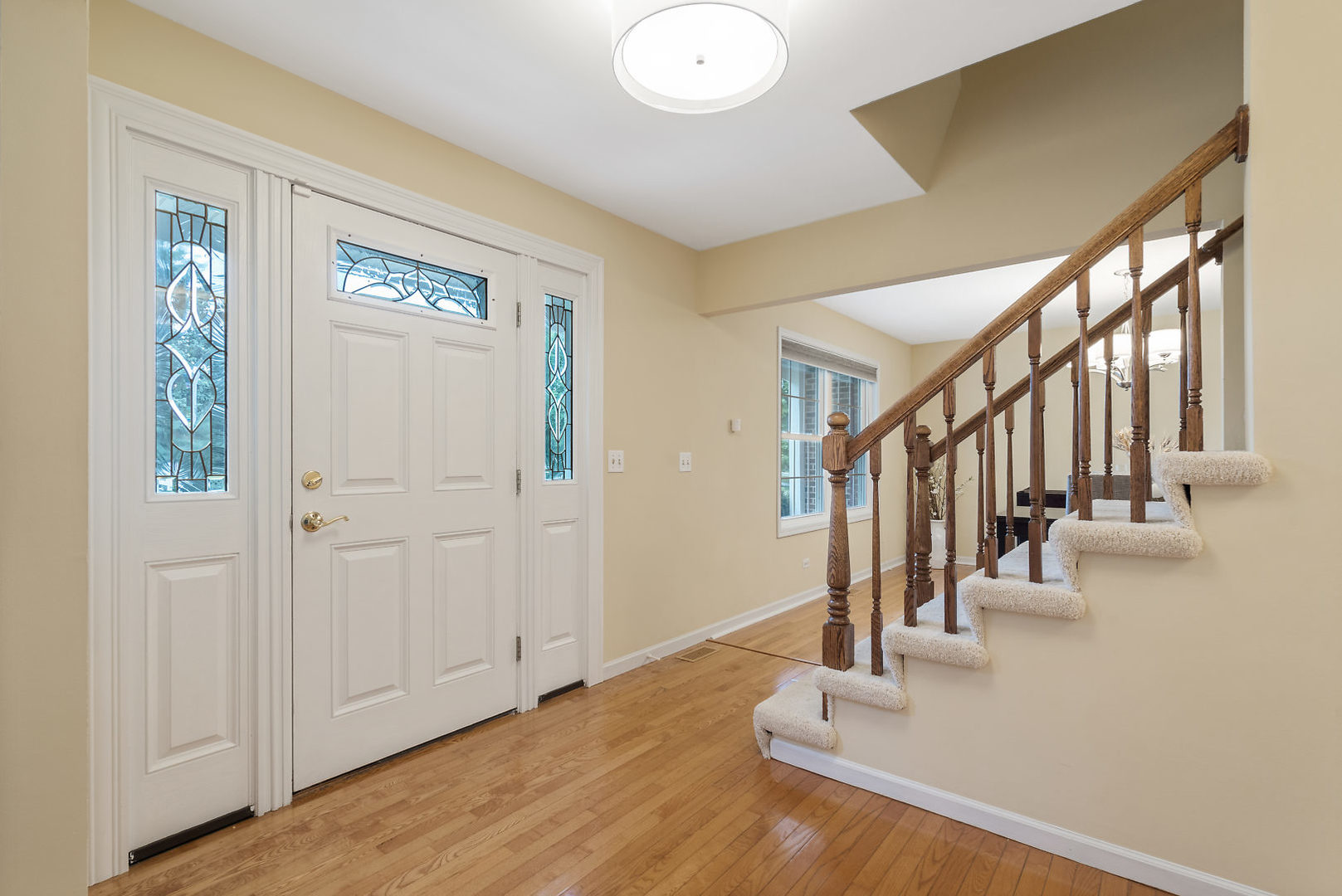 1859 Lisson Road Naperville, IL 60565 - Photo 4 of 32 a view of entryway and hall with wooden floor