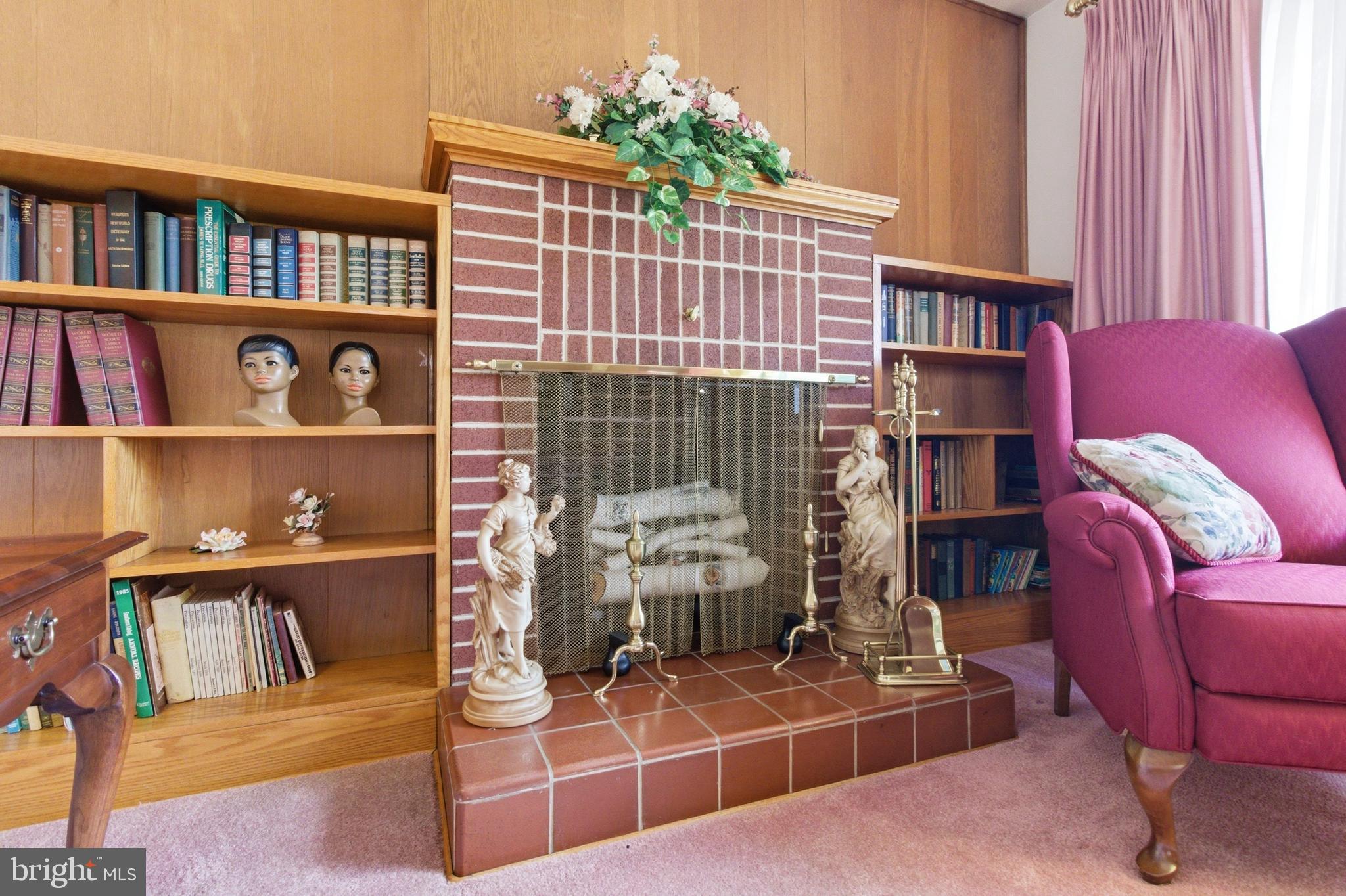 684 Powell Street Hawk Run, PA 16840 - Photo 20 of 35 Close up of fireplace and built in bookshelves.
.