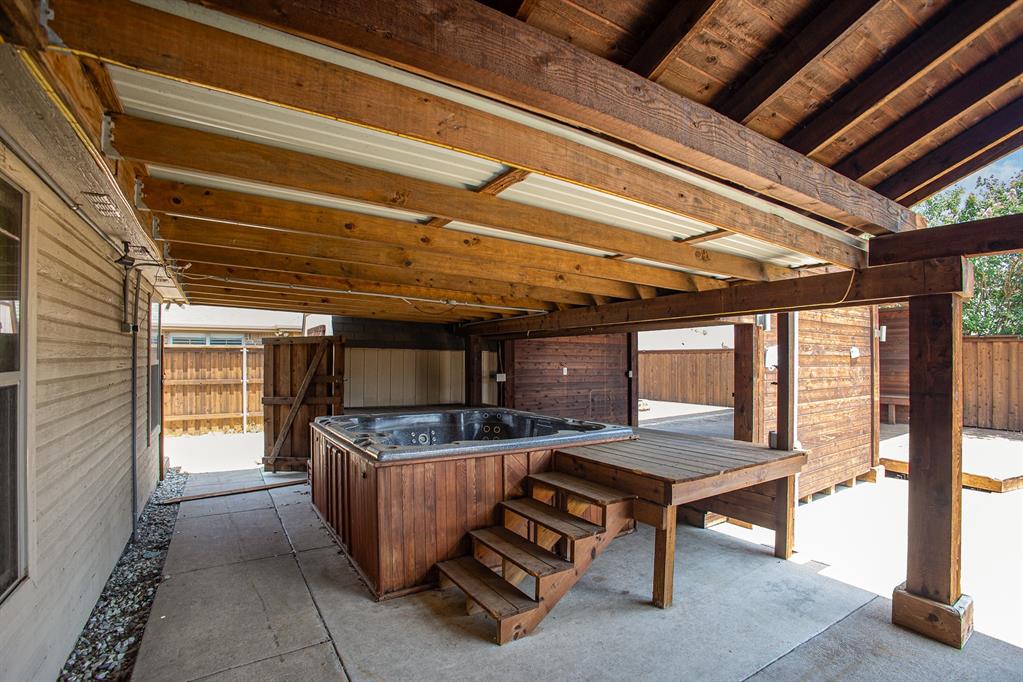 103 Hay Meadow Drive Crandall, TX 75114 - Photo 4 of 10 a room with furniture and flat screen tv