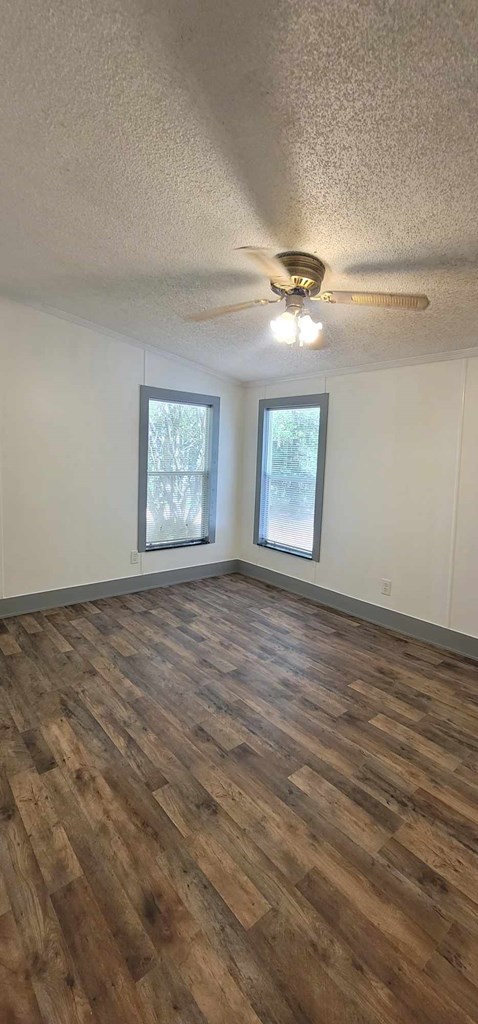 125 Sputnik Street Fortson, GA 31808 - Photo 14 of 30 wooden floor in an empty room with a window