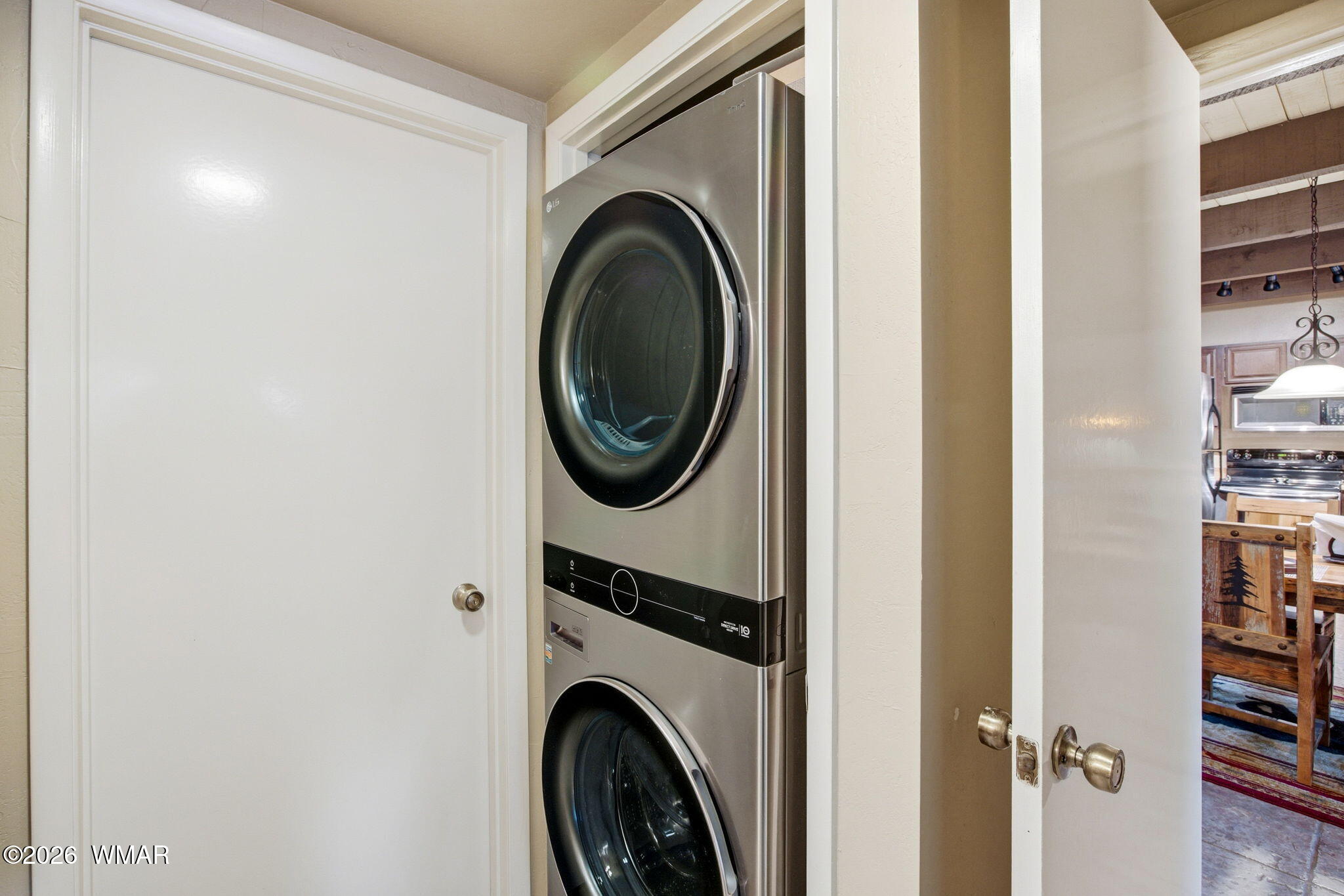 4563 Resort Loop Pinetop, AZ 85935 - Photo 12 of 21 a view of a hallway with washer and dryer