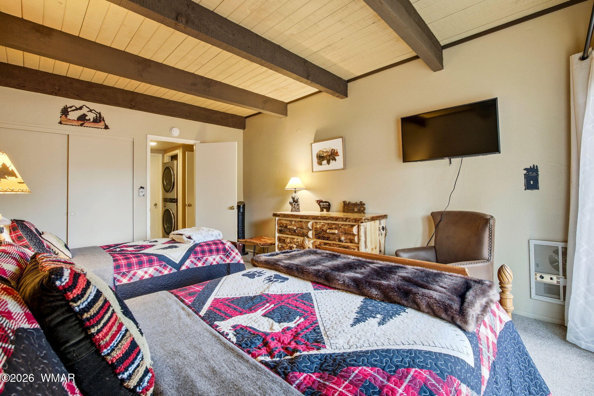 4563 Resort Loop Pinetop, AZ 85935 - Photo 13 of 21 a bedroom with two beds and a flat screen tv
