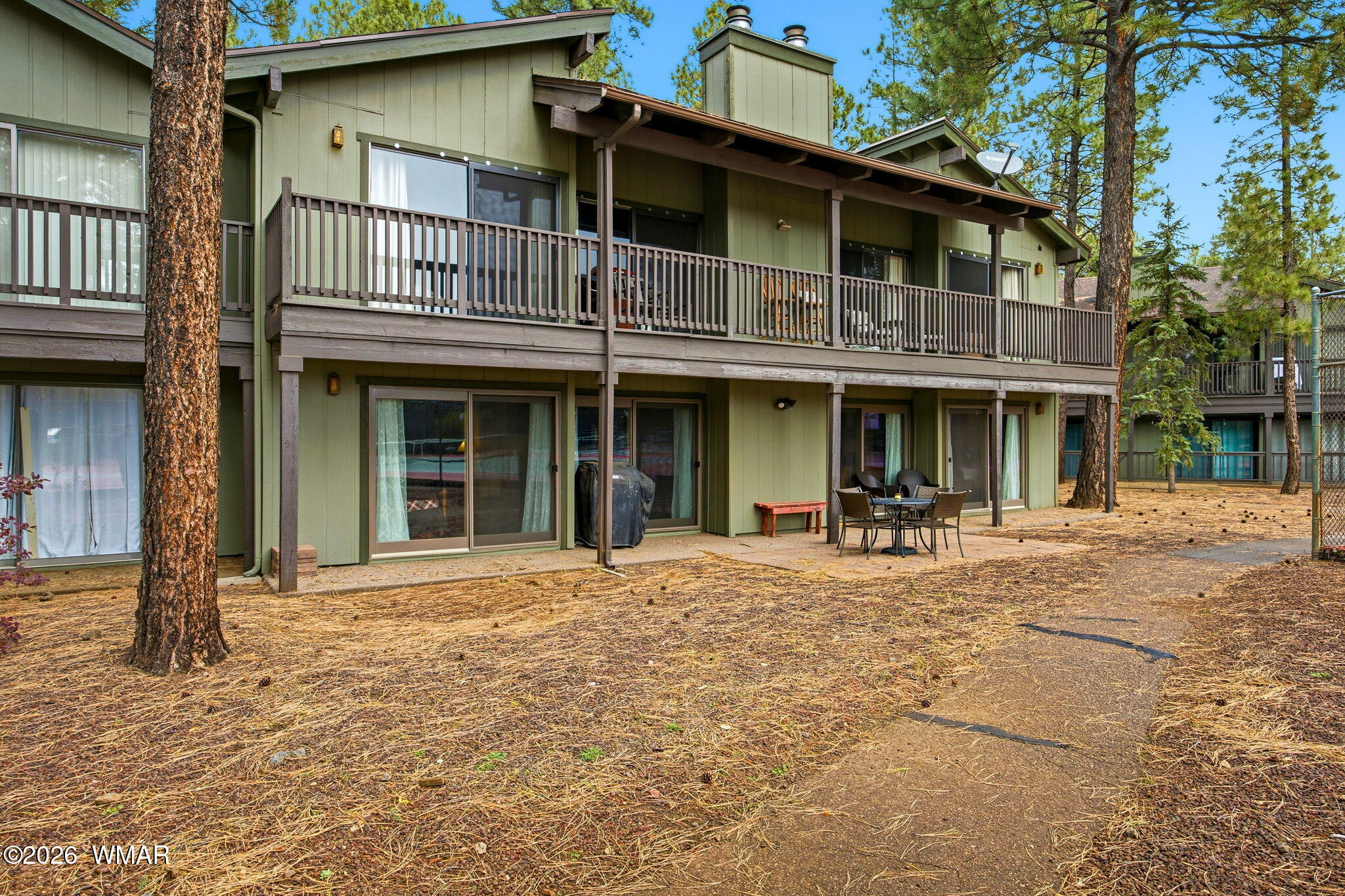 4563 Resort Loop Pinetop, AZ 85935 - Photo 18 of 21 a front view of a house having patio