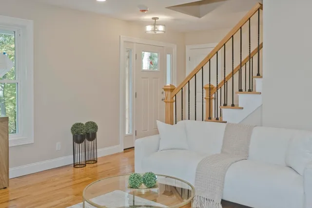 a view of a living room and a fireplace