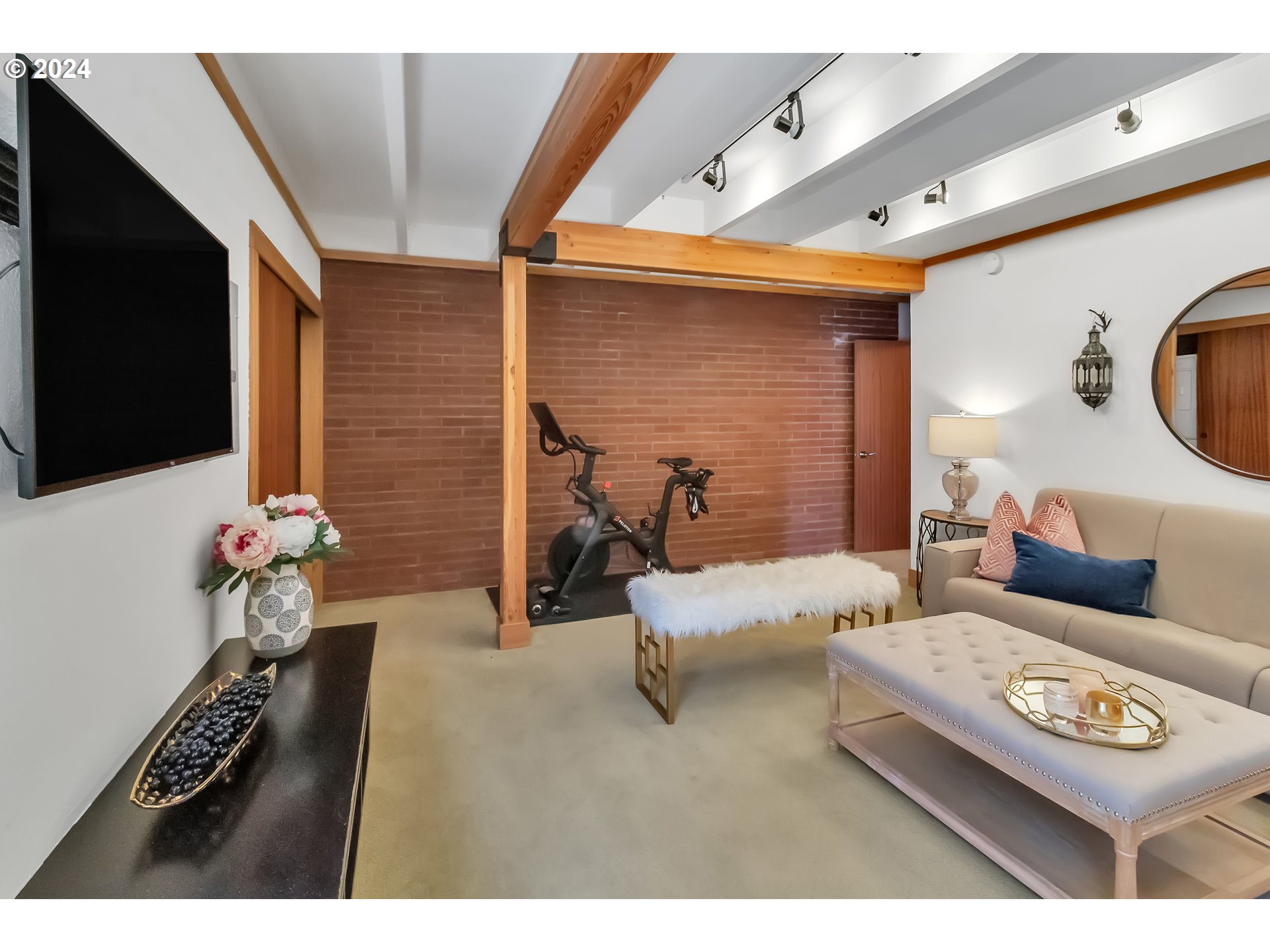 106 High Street Eugene, OR 97401 - Photo 13 of 46 a living room with furniture and a flat screen tv