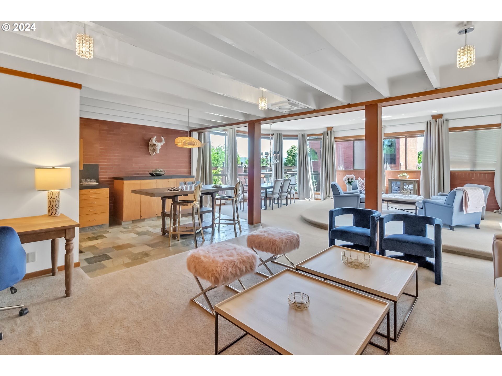 106 High Street Eugene, OR 97401 - Photo 15 of 46 a living room with furniture a table and large windows