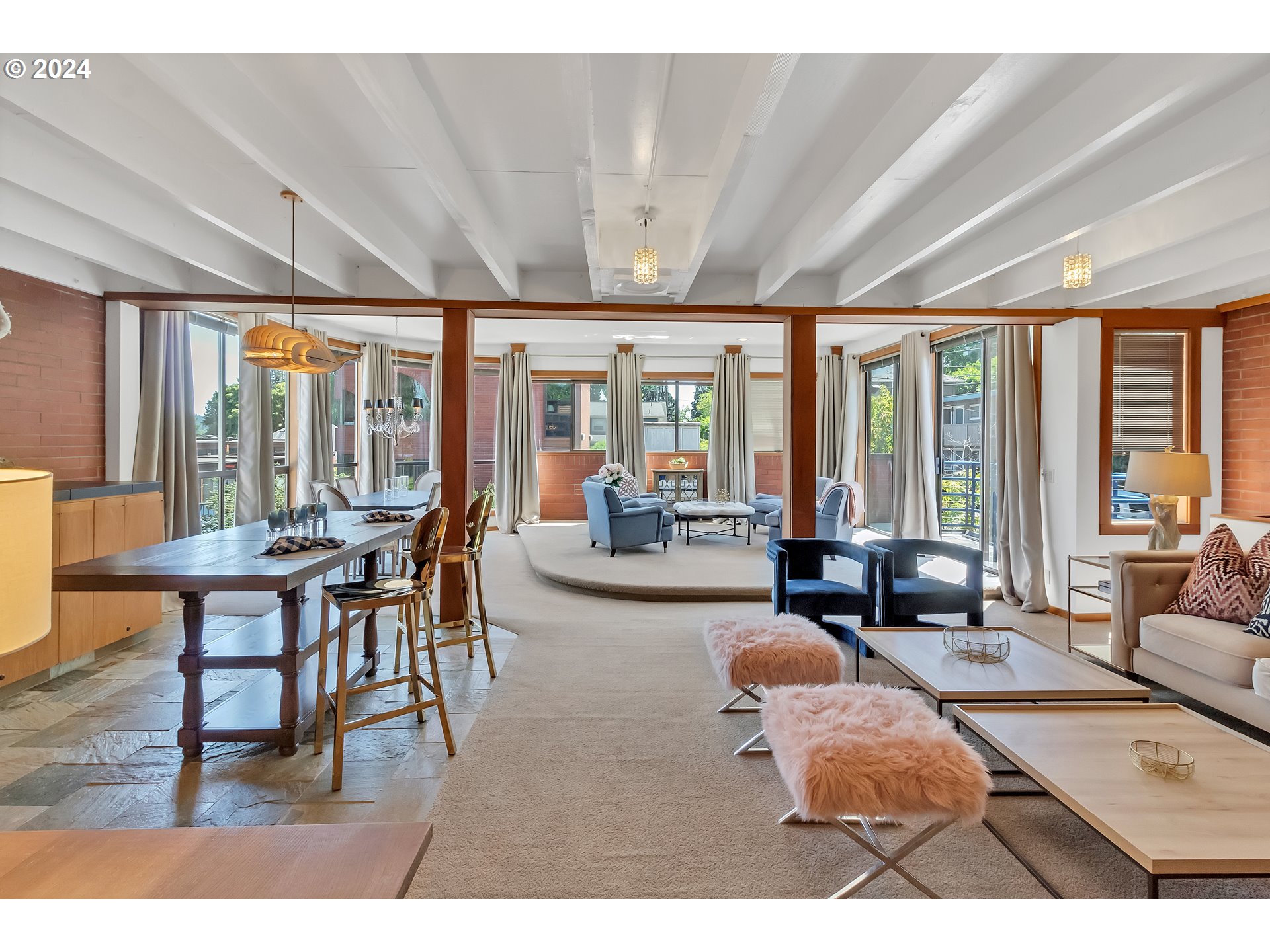106 High Street Eugene, OR 97401 - Photo 17 of 46 a living room with furniture and a large window