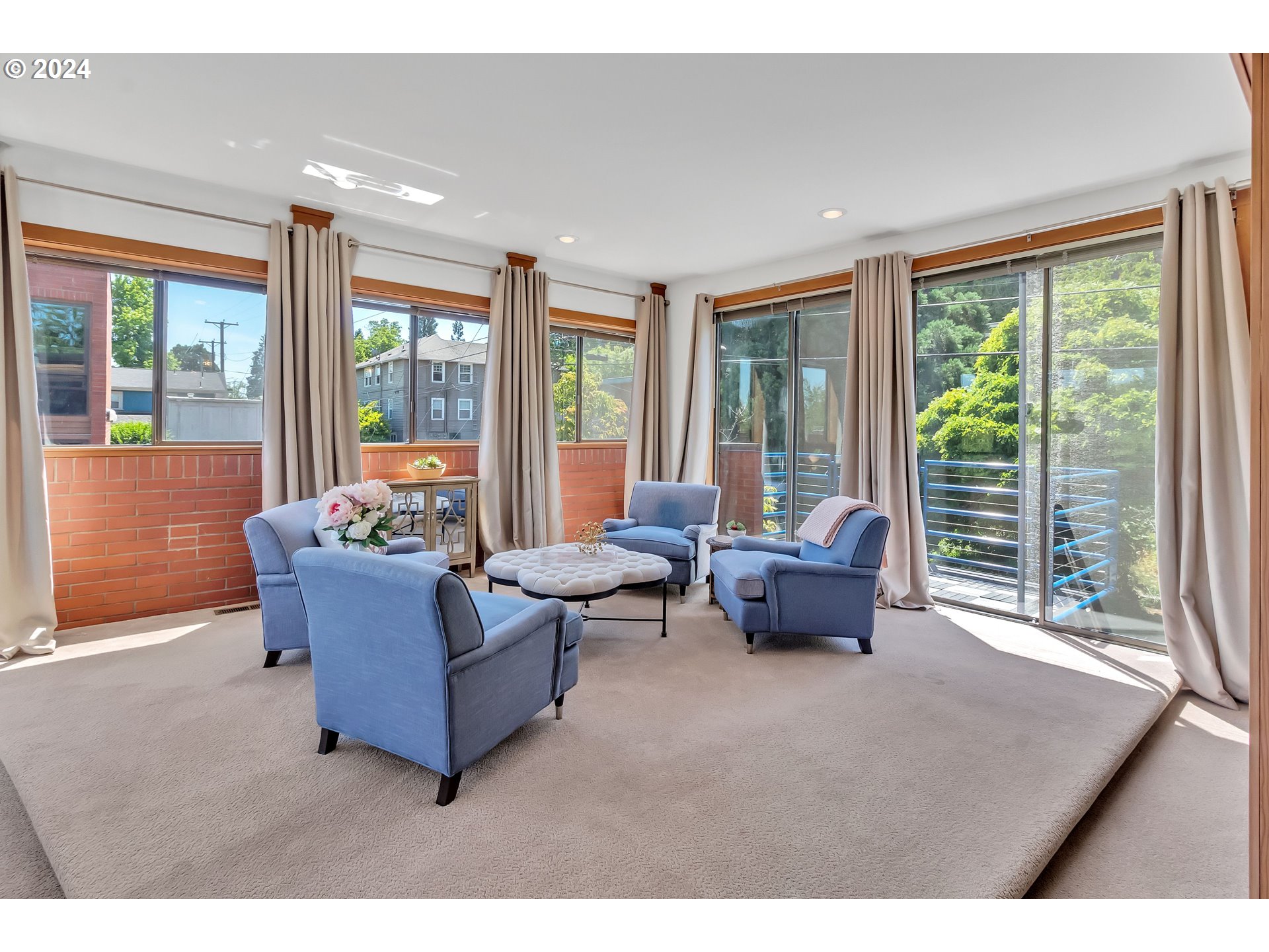 106 High Street Eugene, OR 97401 - Photo 22 of 46 a living room with furniture and a large window