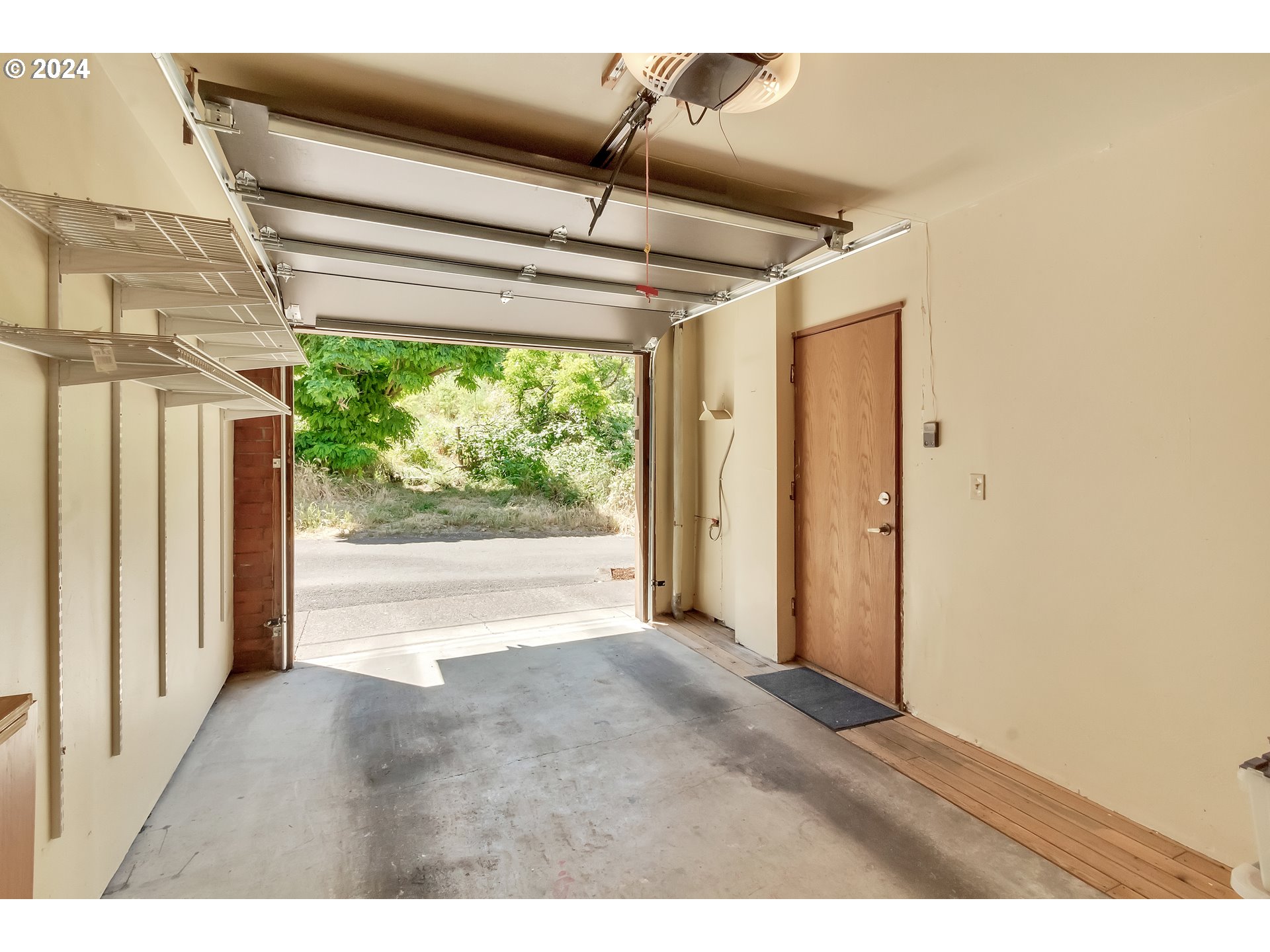 106 High Street Eugene, OR 97401 - Photo 28 of 46 a view of a room with window wooden floor and front door