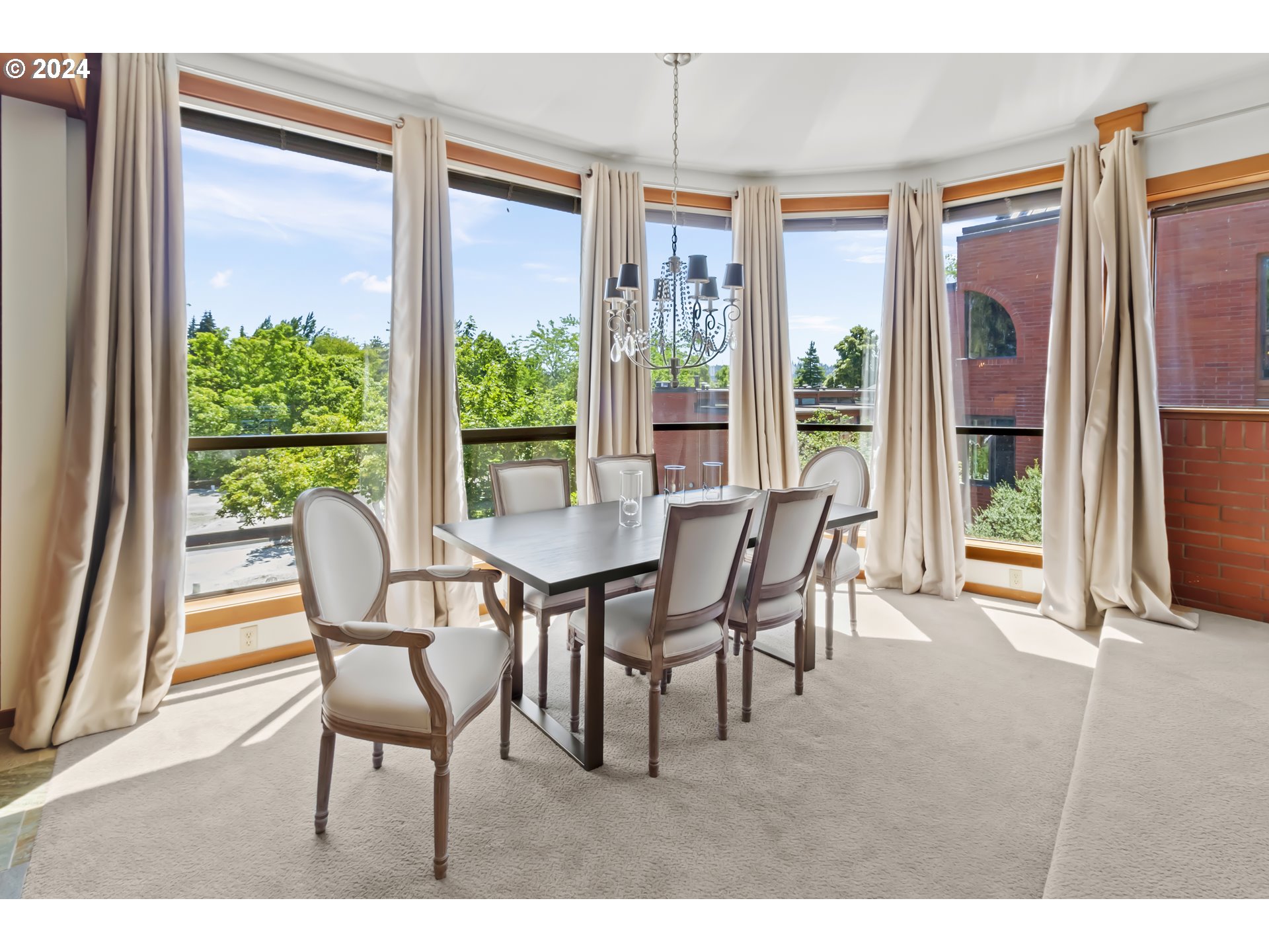 106 High Street Eugene, OR 97401 - Photo 40 of 46 a dining room with furniture and a floor to ceiling window