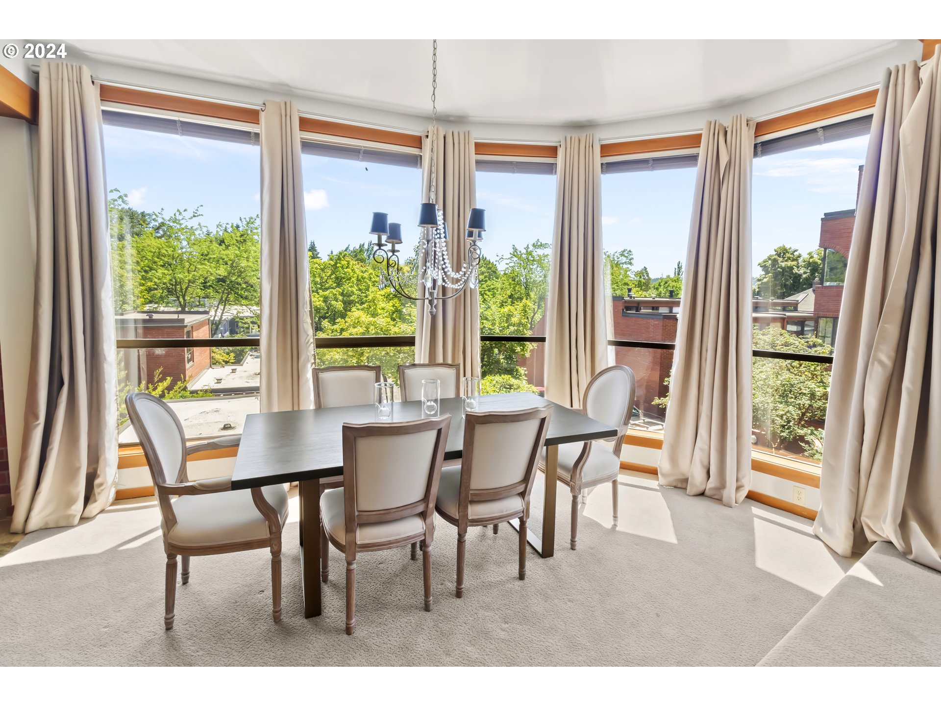 106 High Street Eugene, OR 97401 - Photo 42 of 46 a dining room with a wooden table and chairs