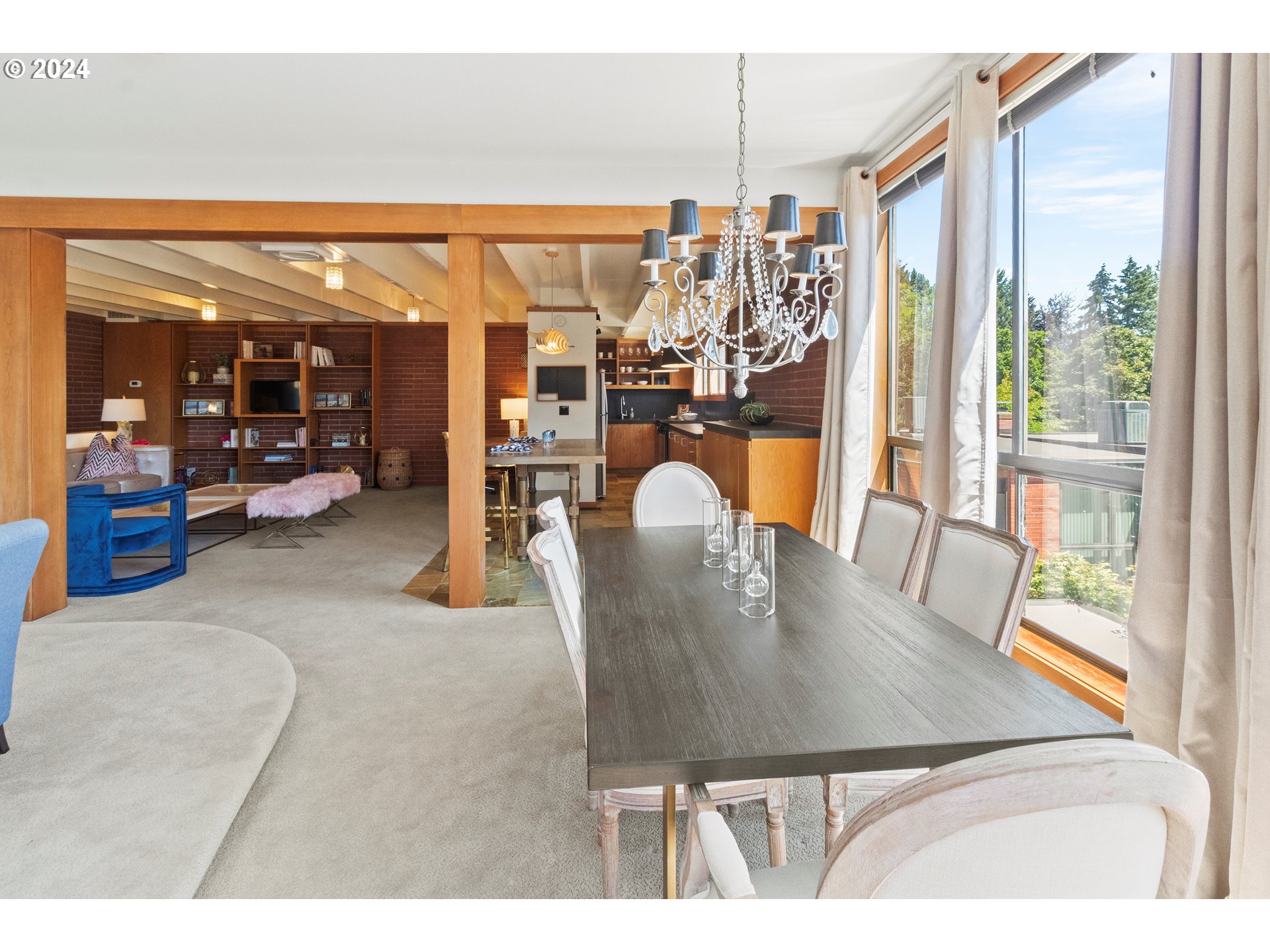 106 High Street Eugene, OR 97401 - Photo 44 of 46 a view of a dining room with furniture and a floor to ceiling window
