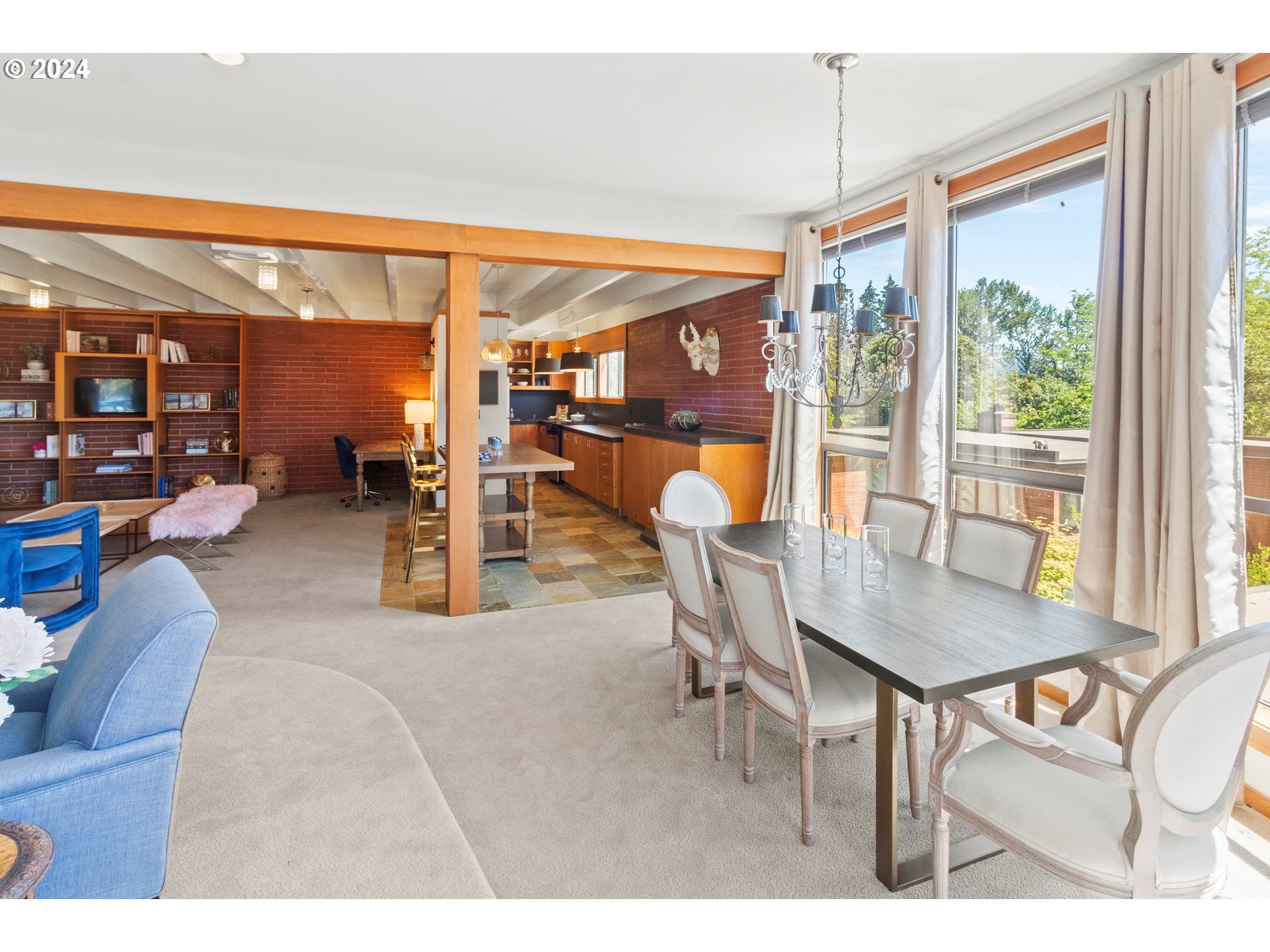106 High Street Eugene, OR 97401 - Photo 45 of 46 a dining room with furniture and a floor to ceiling window