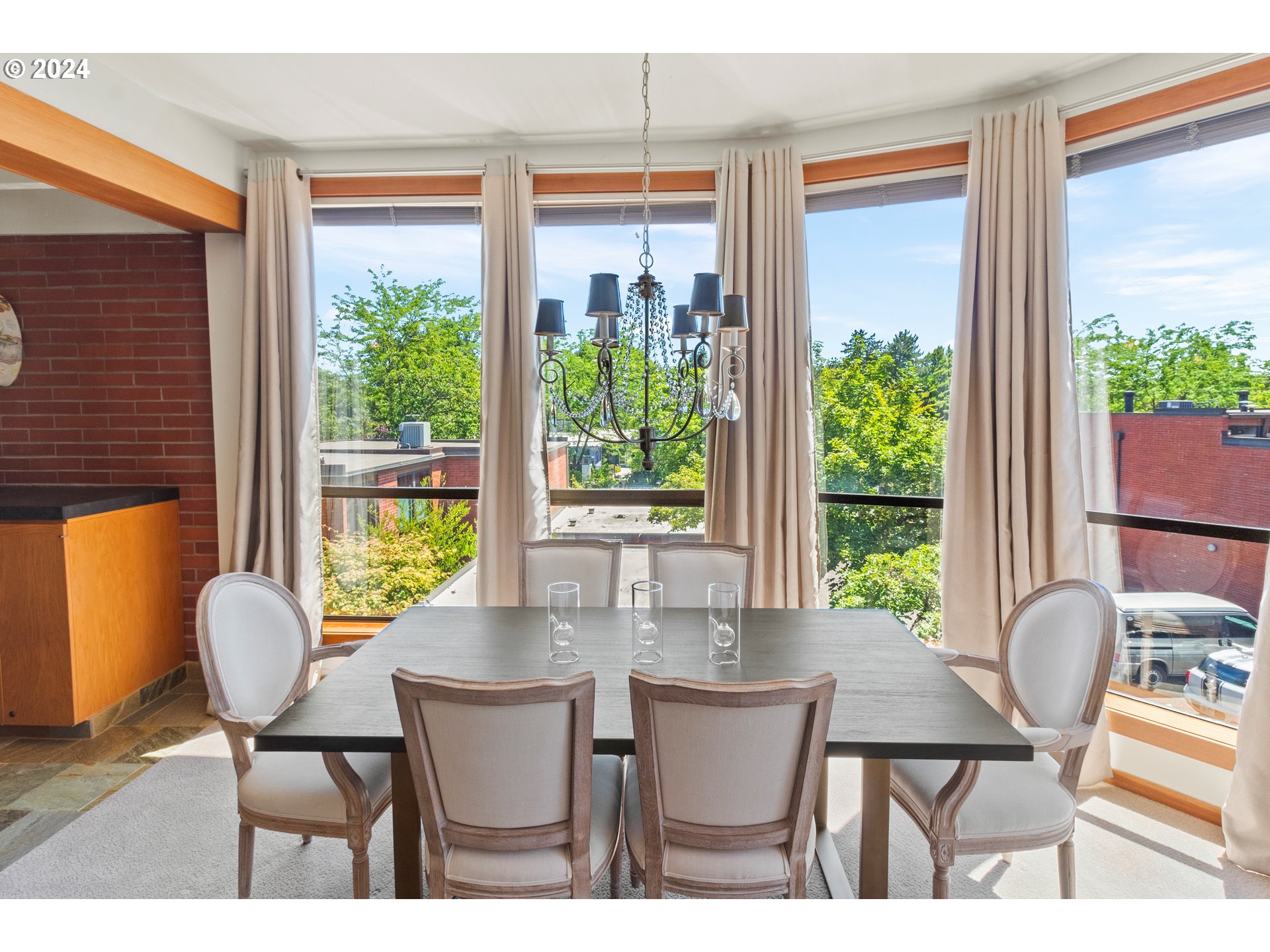106 High Street Eugene, OR 97401 - Photo 46 of 46 a view of a dining room with furniture window and wooden floor