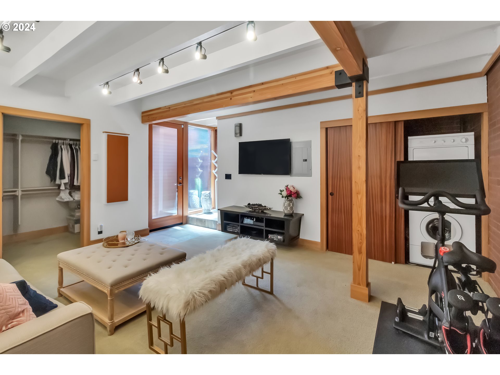 106 High Street Eugene, OR 97401 - Photo 5 of 46 a bedroom with furniture and a flat screen tv