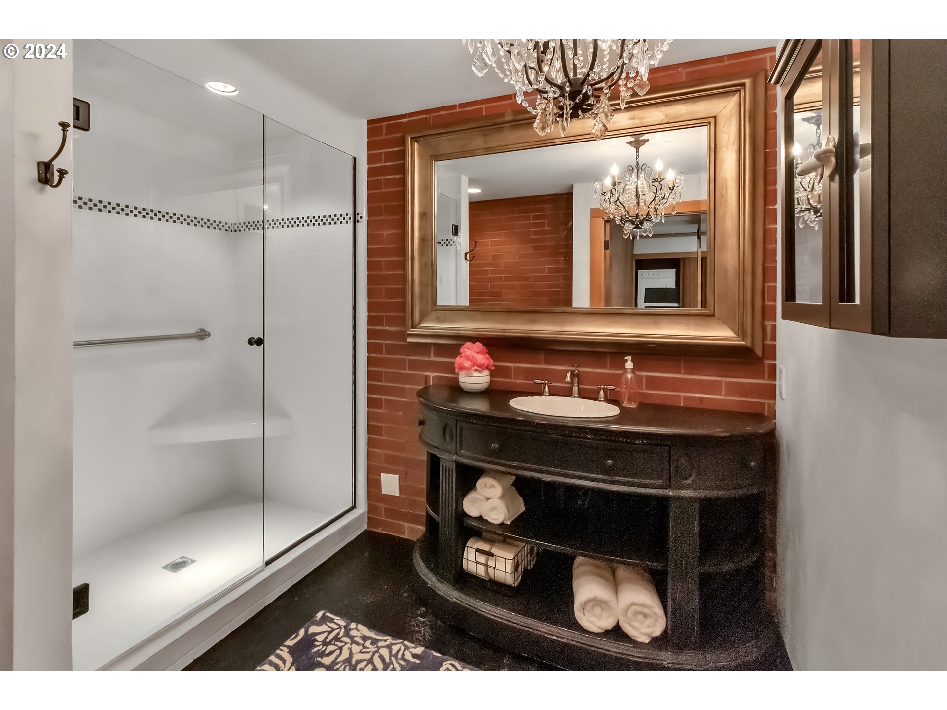 106 High Street Eugene, OR 97401 - Photo 7 of 46 a bathroom with a sink and a mirror