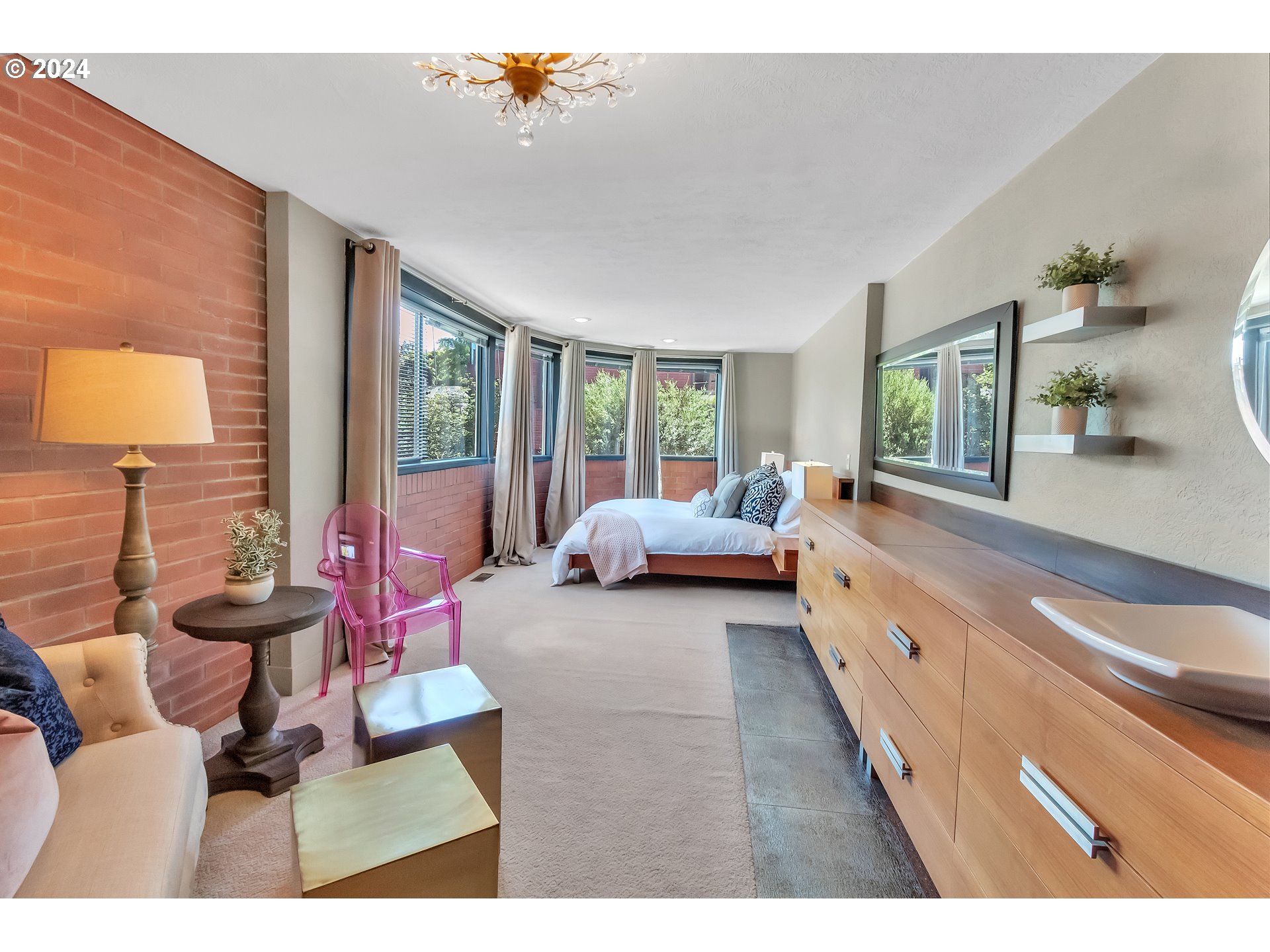 106 High Street Eugene, OR 97401 - Photo 9 of 46 a living room with furniture and a large window