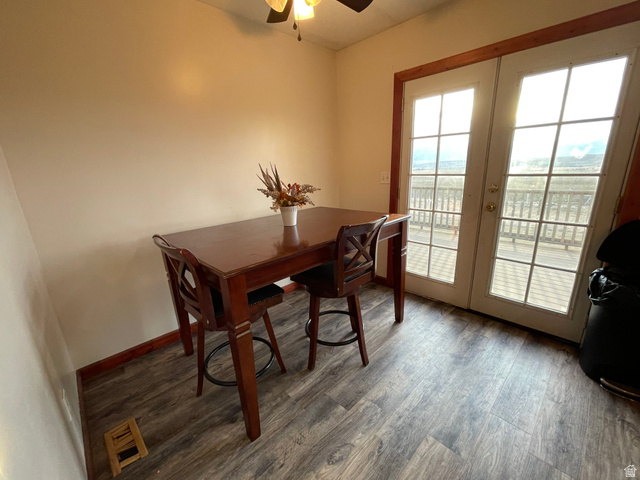 333 Lago Liberty Road Grace, ID 83241 - Photo 23 of 35 Dining area with french doors, wood finished floors, and ceiling fan