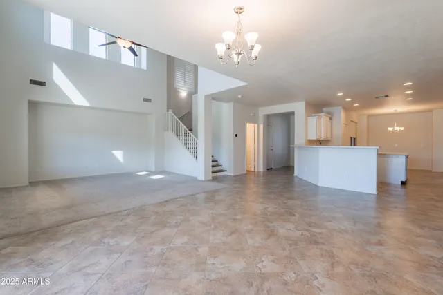 a view of a livingroom with a kitchen