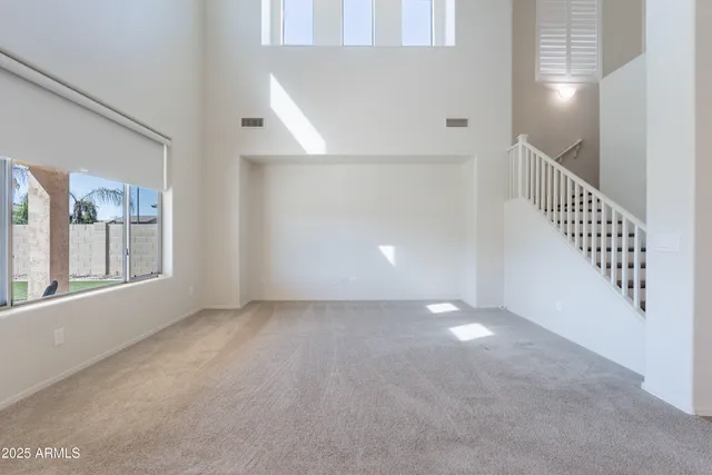 a view of a hallway with staircase