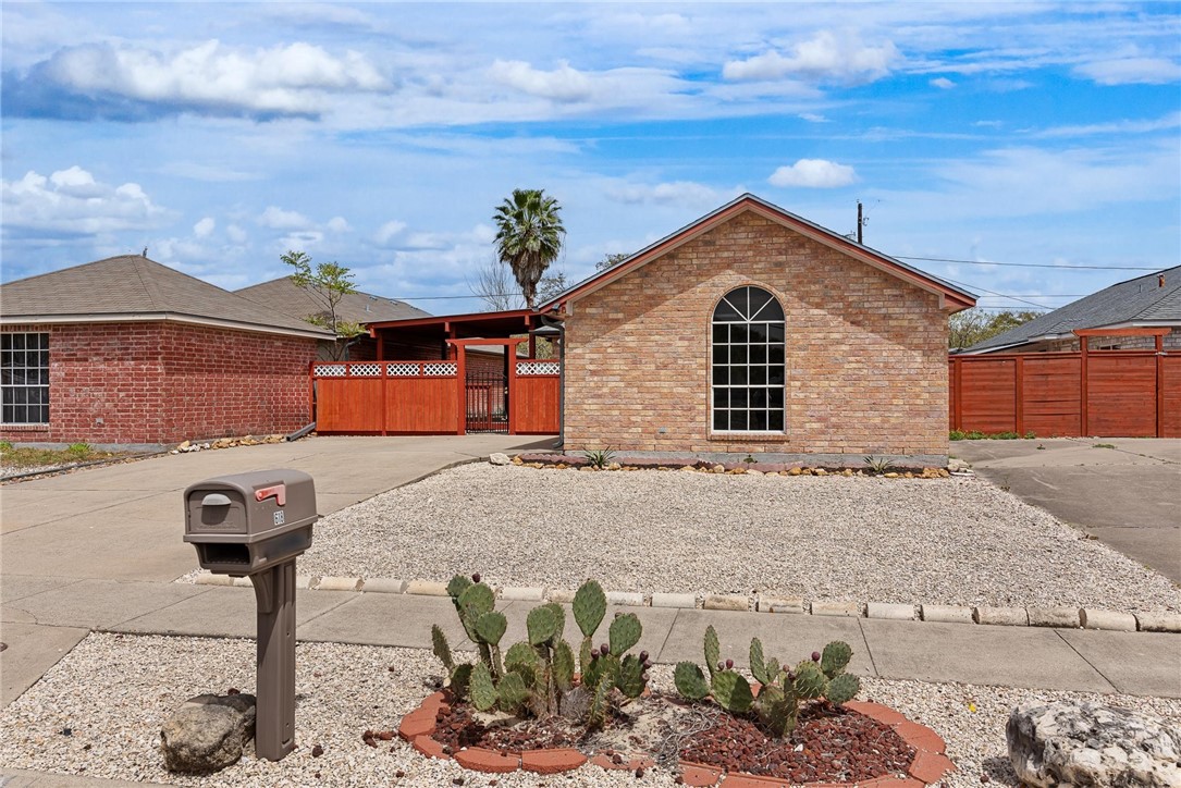 618 Kaipo Drive Corpus Christi, TX 78418 - Photo 1 of 1 a view of a house with wooden fence