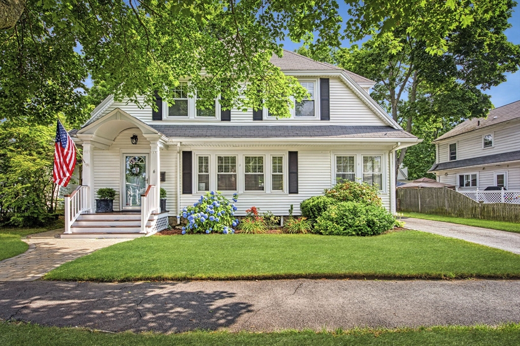 6 Pilgrim Road Marblehead, MA 01945 - Photo 2 of 42 a front view of a house with a garden and plants