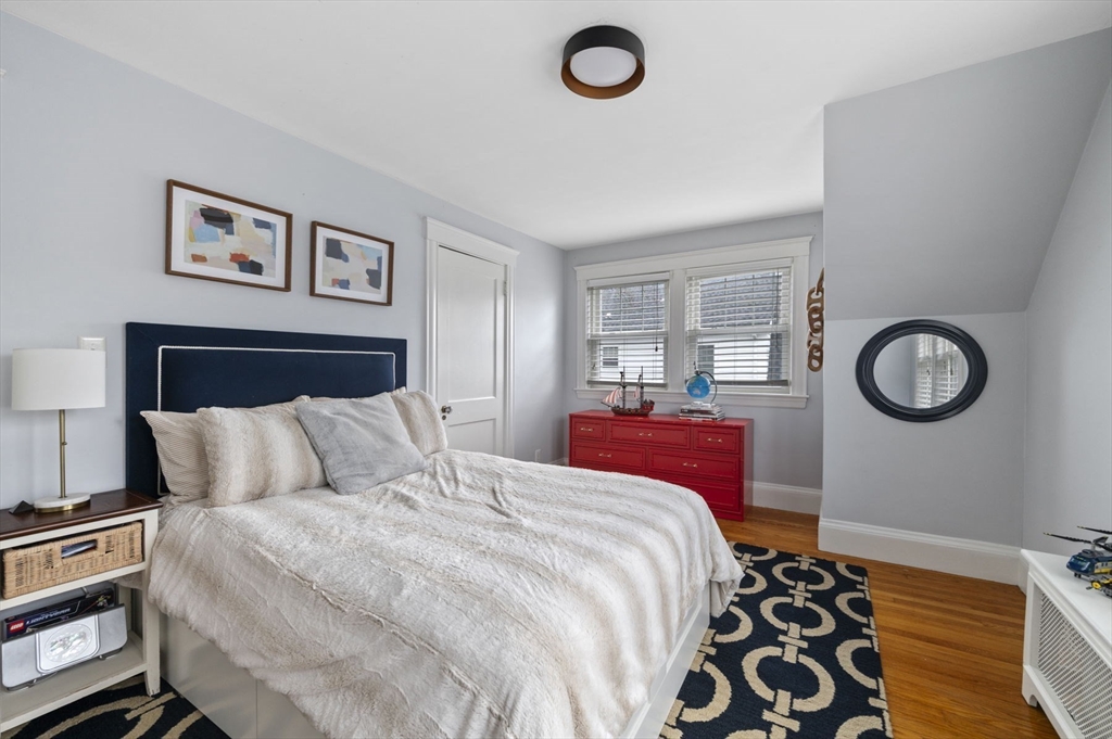 6 Pilgrim Road Marblehead, MA 01945 - Photo 29 of 42 a bedroom with a bed and a window