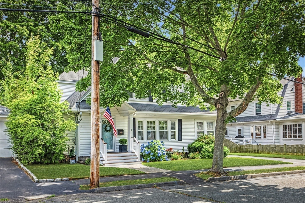 6 Pilgrim Road Marblehead, MA 01945 - Photo 40 of 42 a front view of a house with a yard
