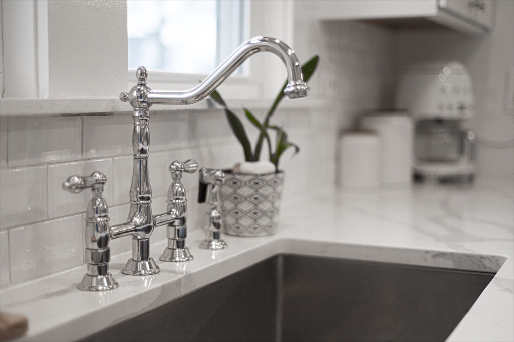6 Pilgrim Road Marblehead, MA 01945 - Photo 9 of 42 a bathroom with a sink and a mirror