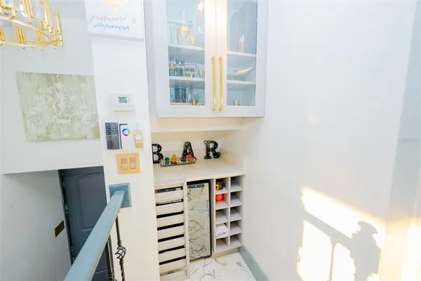 a bedroom with bed and wooden floor