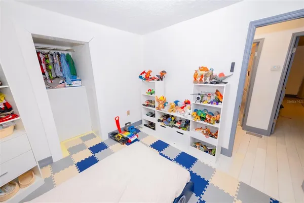 a room with furniture and toys