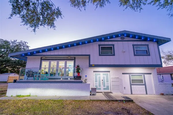 a front view of a house with yard
