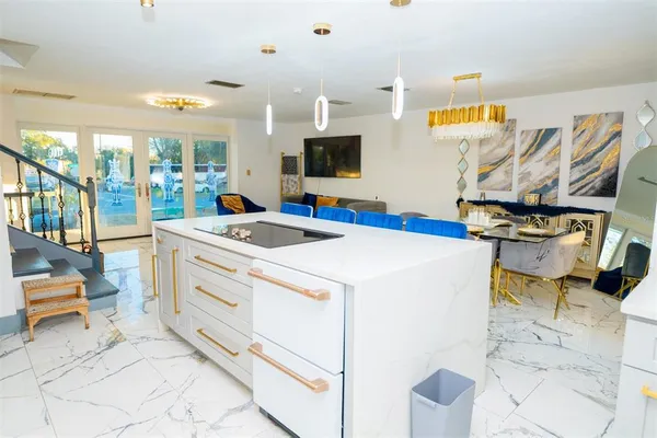 a view of living room with furniture and flat screen tv