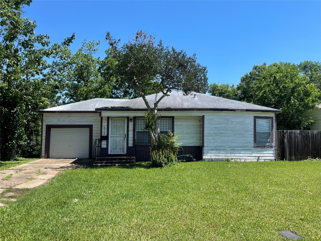 4623 Perry Street Houston, TX 77021 - Photo 2 of 9 a view of a house with a yard and large tree