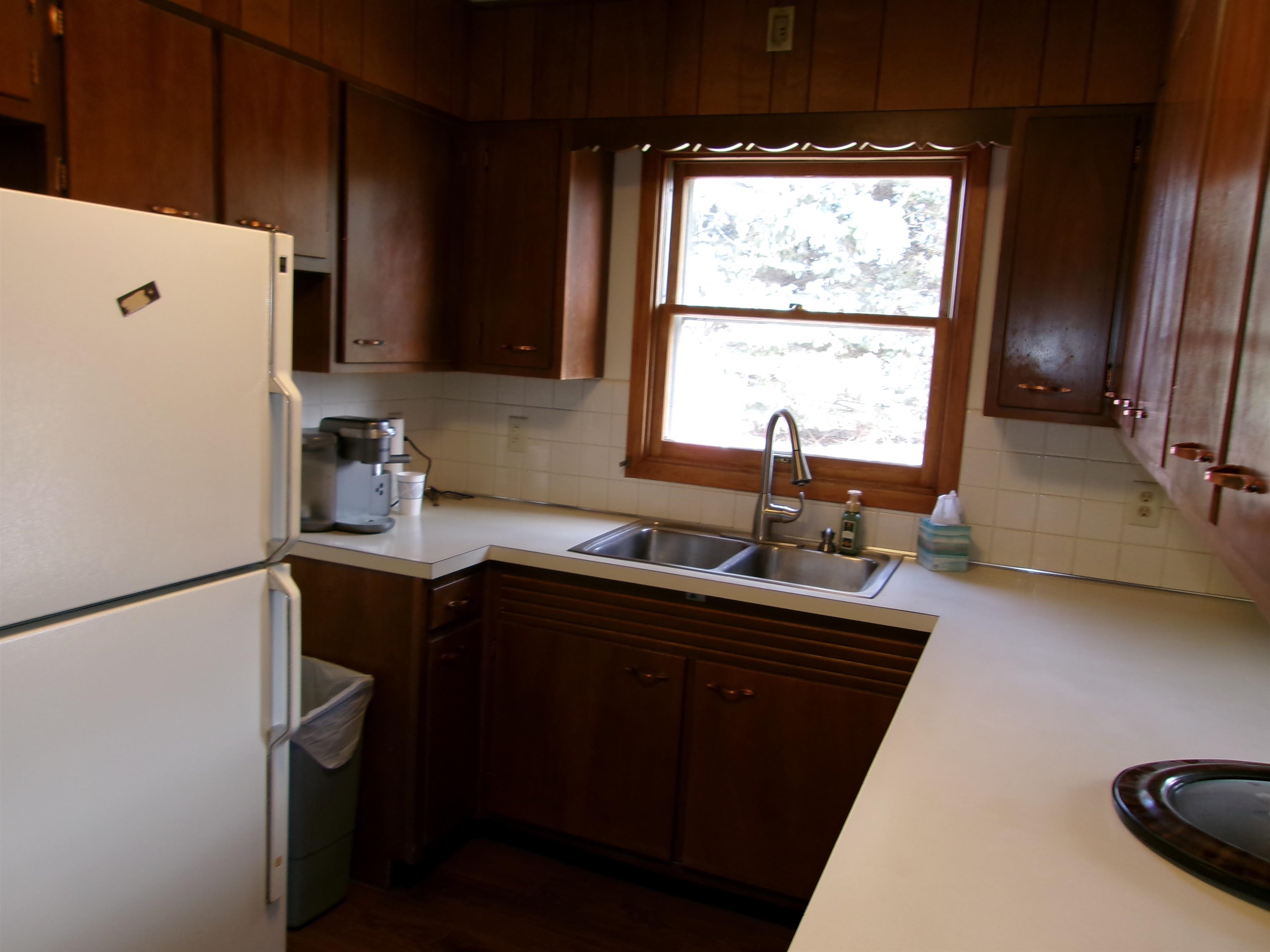 2517 Rock Street Peru, IL 61354 - Photo 4 of 12 a kitchen with a sink a window and appliances
