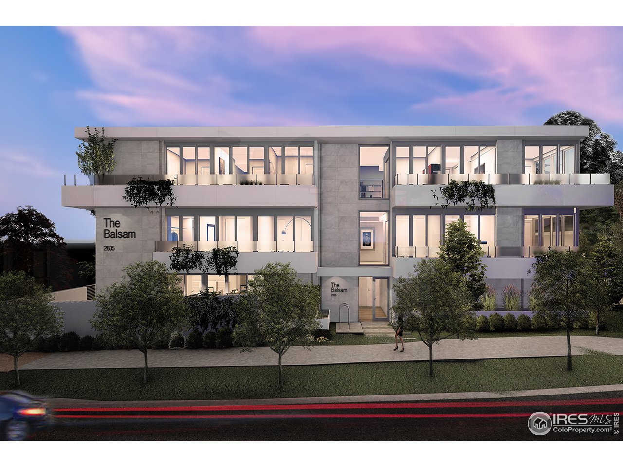 a view of building in front of a yard