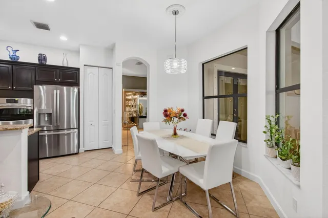 a work room with furniture and windows