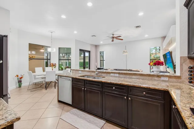 a view of a yard with palm trees