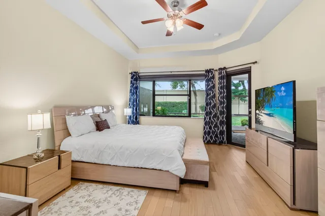 a view of a swimming pool with a yard